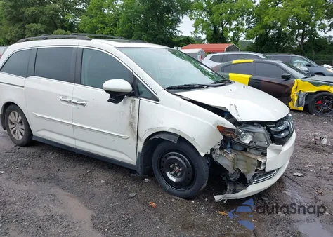 2014 Honda Odyssey Ex-L z USA, uszkodzony, nr VIN 5FNRL5H67EB055574
